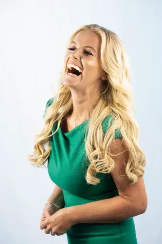 Laura Naylor laughing green dress